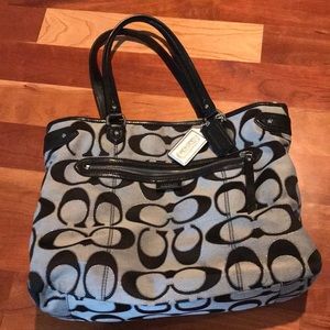 Black and gray Coach purse